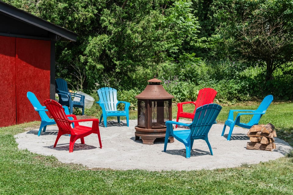 Cozy up around the fire pit with friends and family, perfect for evening chats under the stars