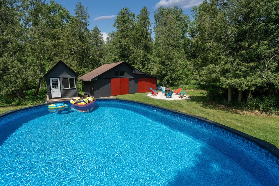 Take a refreshing dip in the sparkling outdoor pool, ideal for summer fun and relaxation.