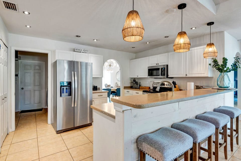 Kitchen | Stainless Fridge | Bright White Cabinets