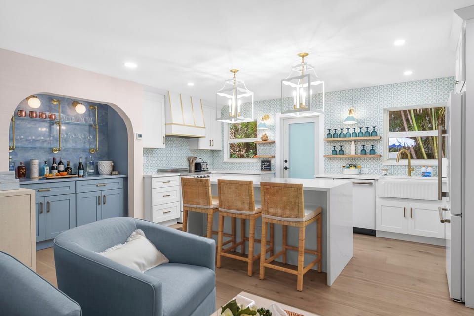 A chef’s dream! This fully equipped, modern kitche and a spacious island for gathering.