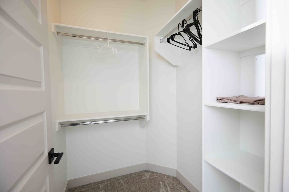 Walk in closet in primary suite