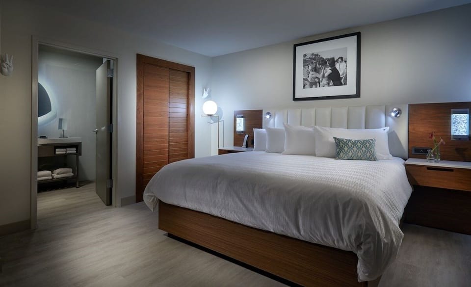 Drift off comfortably with bedside lighting and sleek modern design.