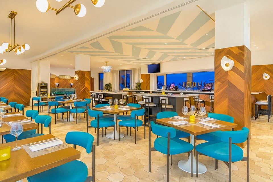 Savor breezy breakfasts in a bright, coastal-chic dining room.