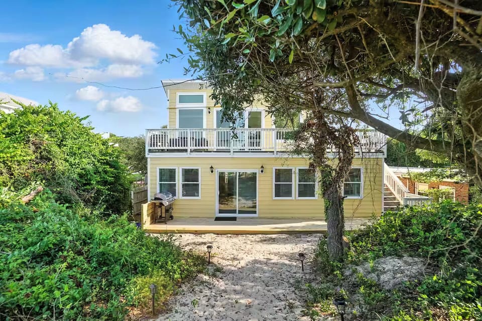 This Bayfront retreat sits right on the sand with private dune access. 