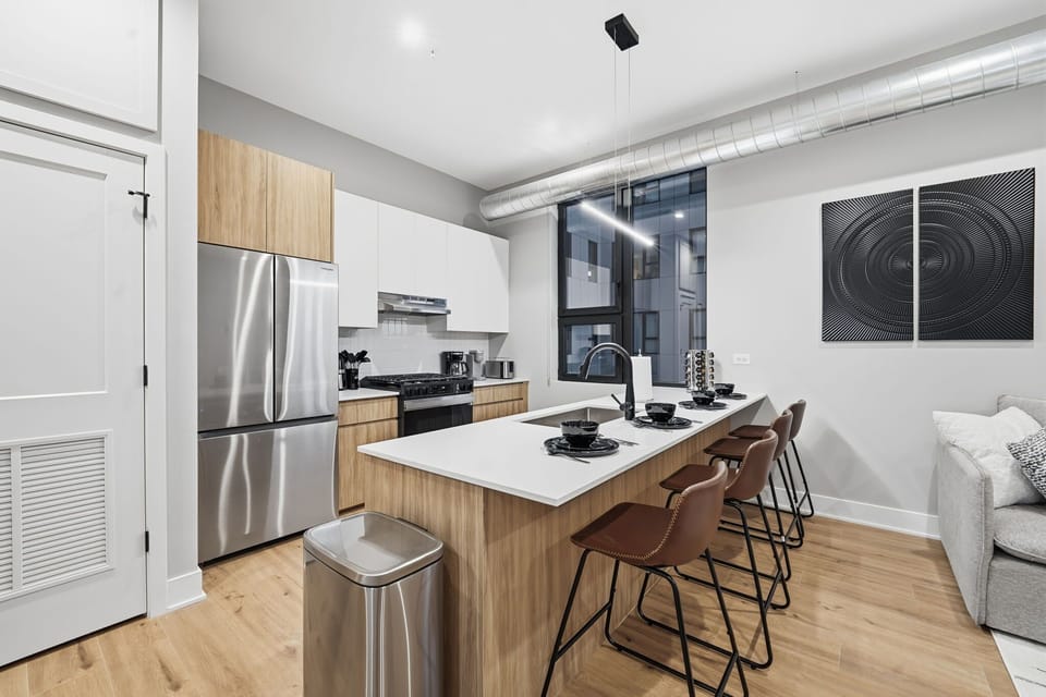Bright kitchen island set up for quick breakfasts or lingering coffee moments
