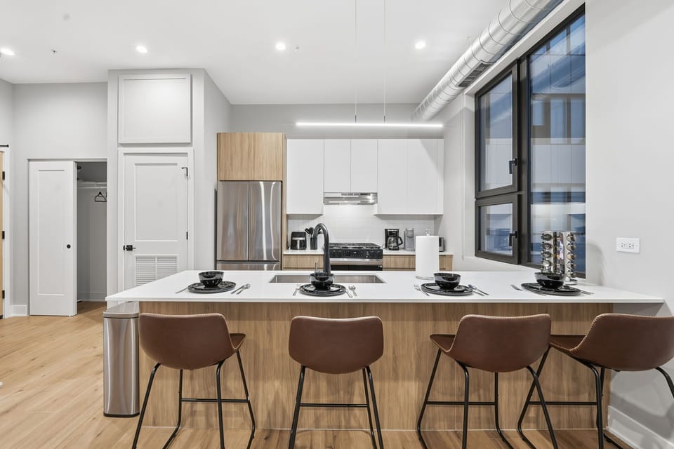 Bright kitchen island set up for quick breakfasts or lingering coffee moments