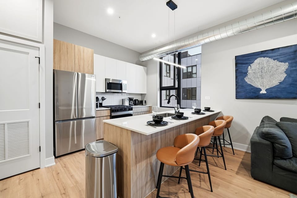 Bright kitchen island set up for quick breakfasts or lingering coffee moments