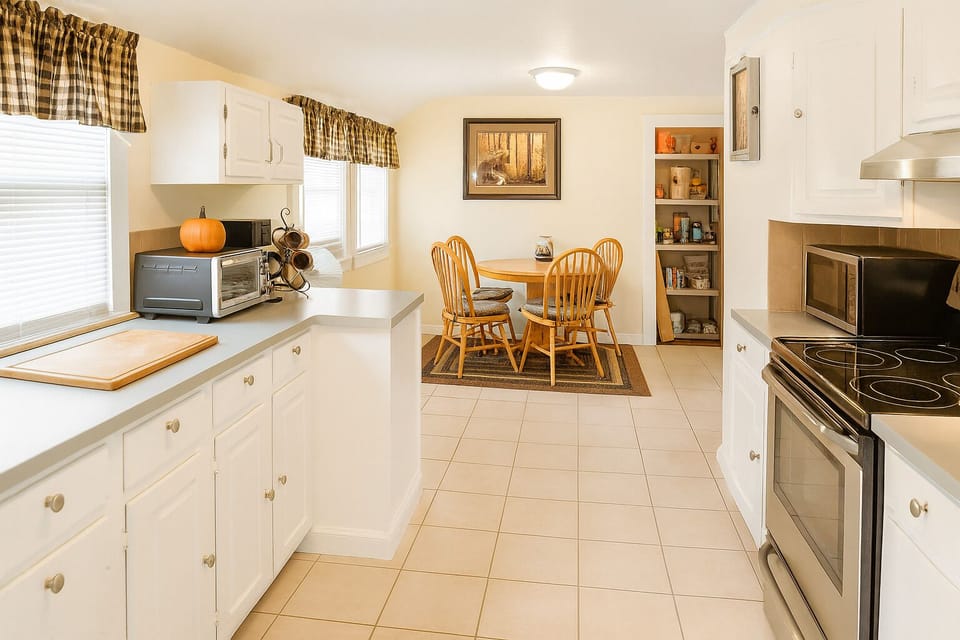 Bright, fully equipped kitchen with dining area—perfect for family meals