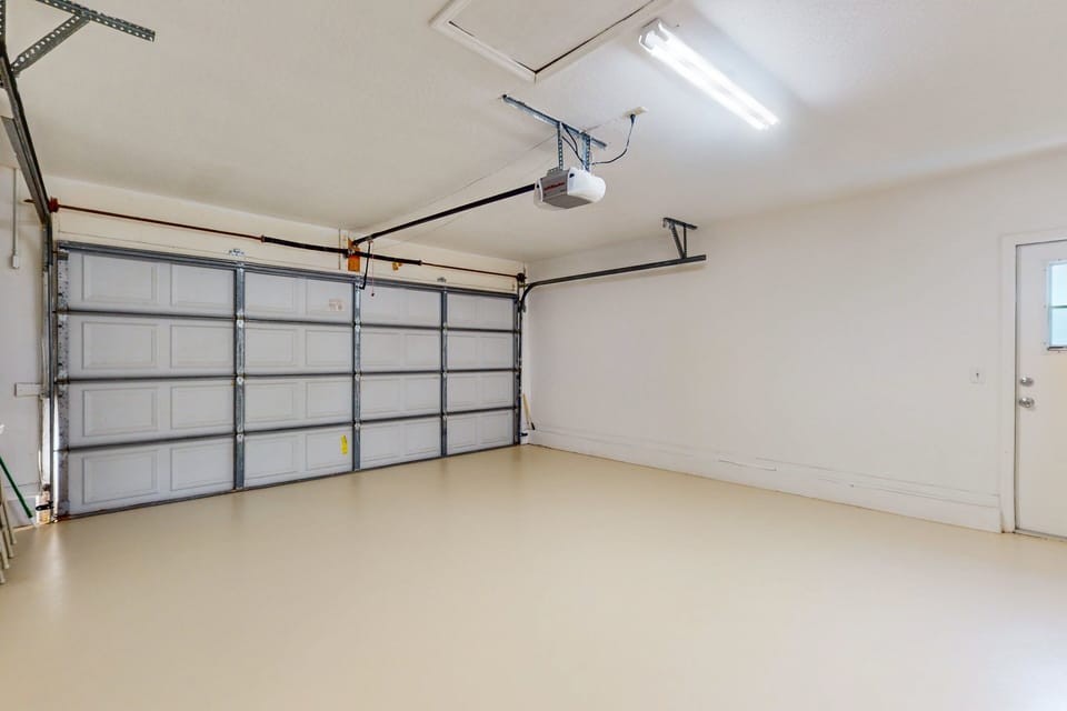 The two car garage is spacious and has a washer and dryer.