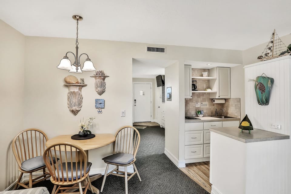 The dining area has seating for three people.