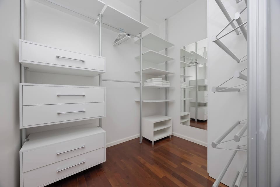Practical utility room with storage cabinets.