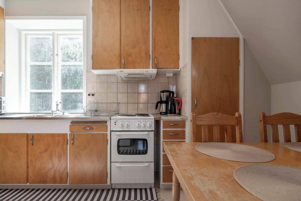 Fully equipped kitchen with all necessities for you to prepare your meals. You also have an oven, full fridge and freezer, coffee maker, kettle, stove, and a seating area for up to 4 guests.