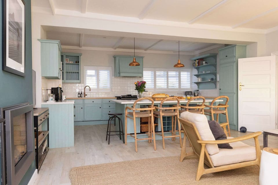 Spacious open-plan kitchen with range cooker.