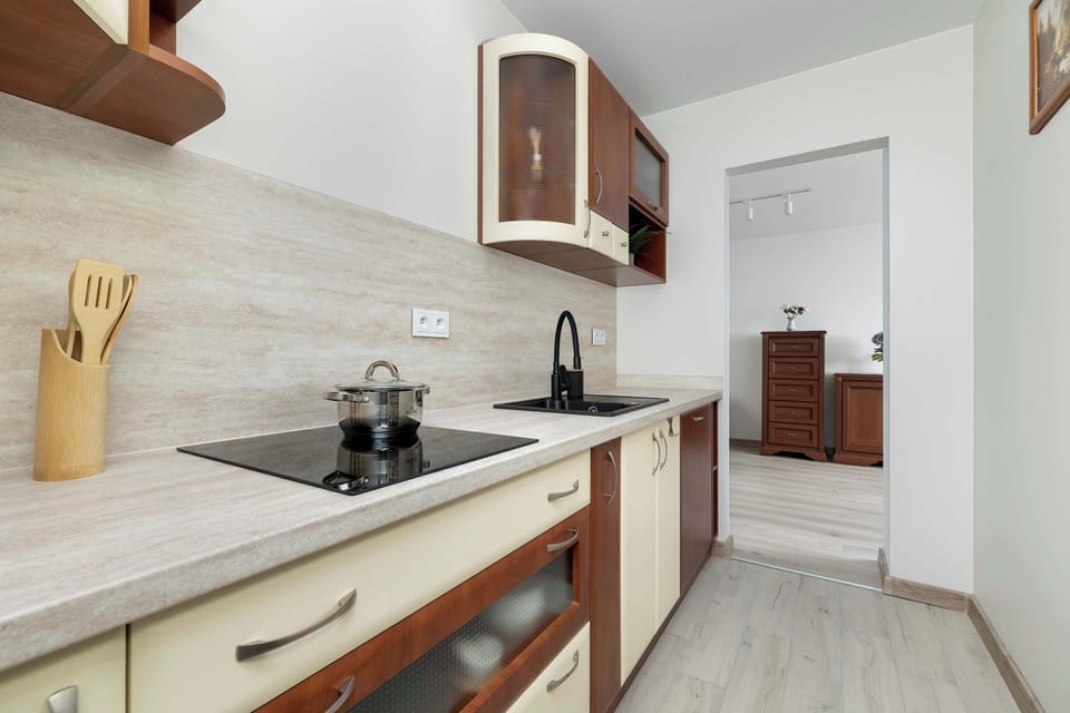 The kitchenette's practical layout maximizes space and functionality.