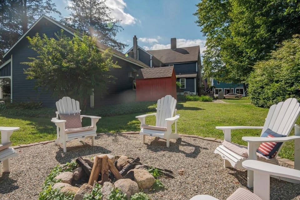 Cozy up to the shared firepit! 

We offer a bundle of wood to get you started (look in the red shed). 