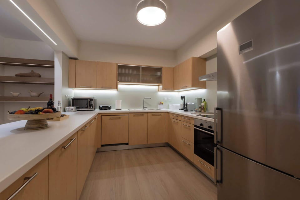 Fully equipped modern kitchen with sleek finishes