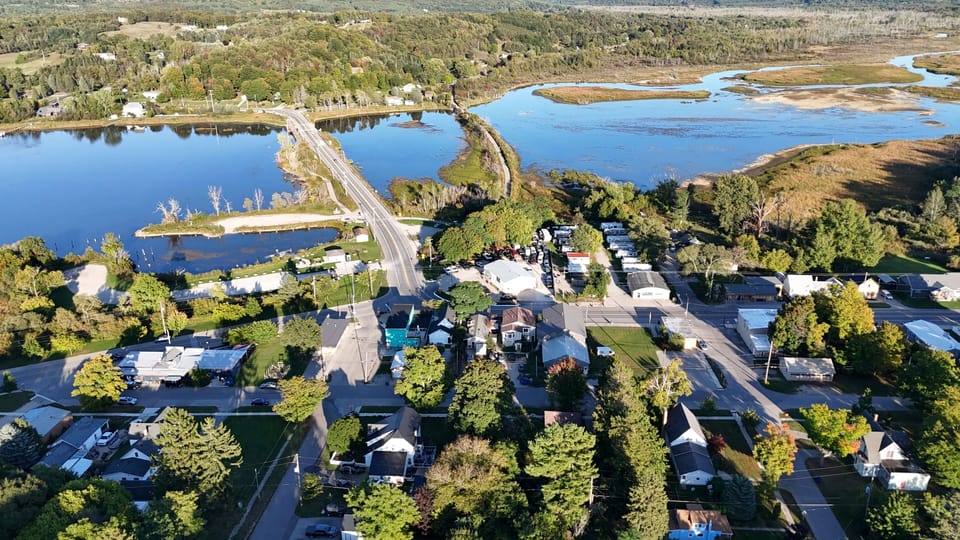 EXTERIOR:  Another aerial view of downtown Elberta from the west with the Betsie River and Betsie Bay in the background