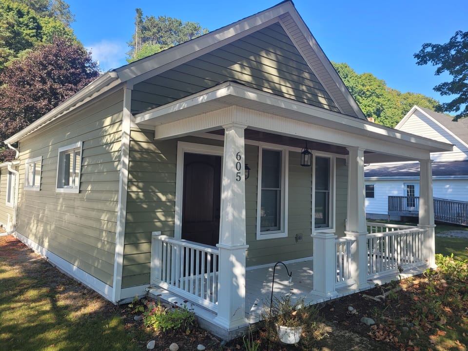 OVERVIEW:  The front of the house, highlighting the very cute front porch.