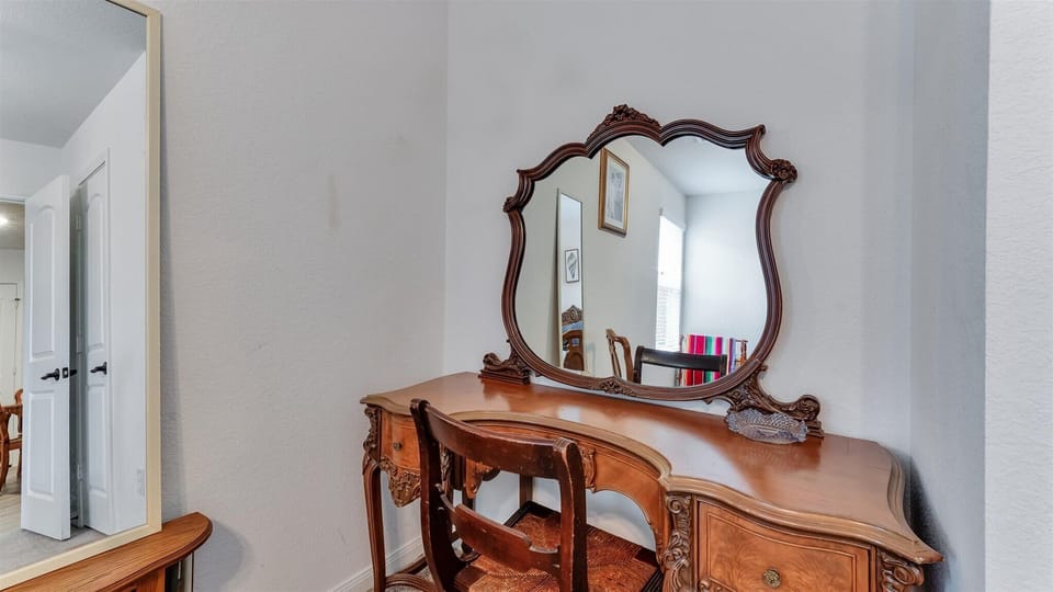 Prepare for your day at an elegant antique vanity in this serene Queen suite!