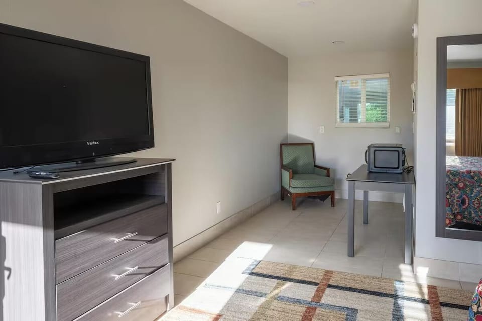Kick back with your favorite shows and a simple work spot.