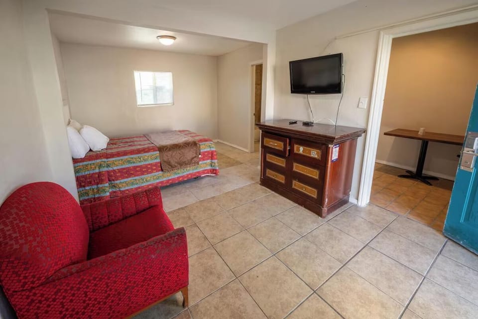 Relax after adventures with an easy-view bed and TV setup.