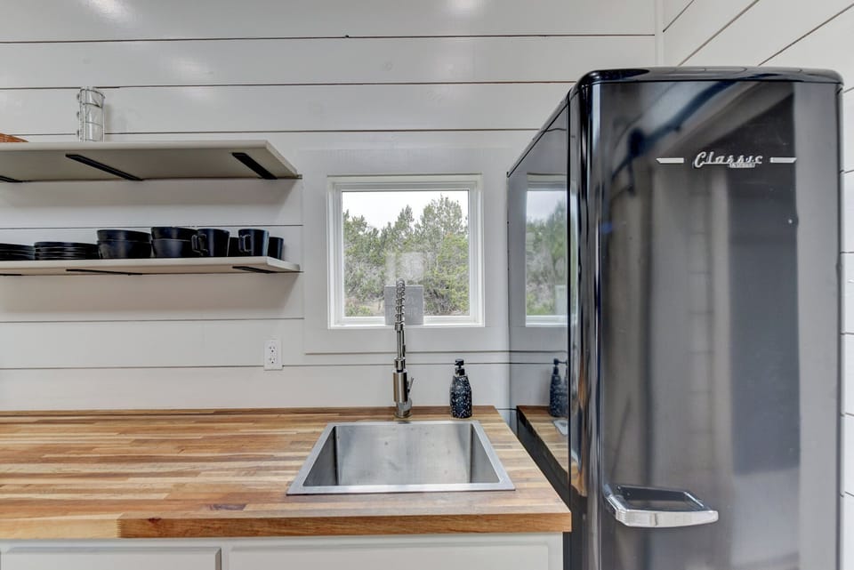 The tiny home features a kitchenette