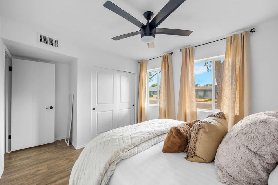 Retreat to this tranquil queen bedroom, designed for ultimate comfort and rest.