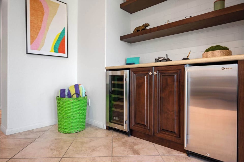 Wet bar with wine fridge and extra storage