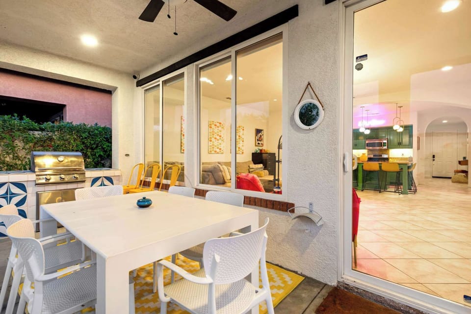 Outdoor dining area steps from the pool