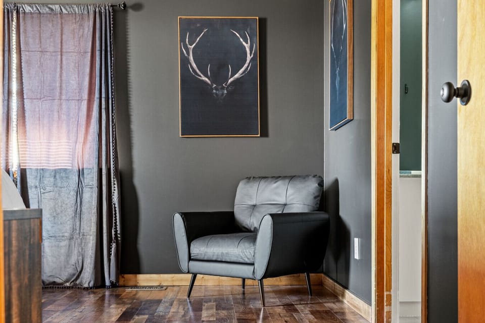 A cozy reading nook tucked into the primary suite.