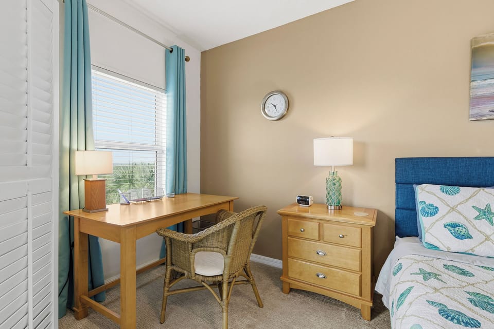 Enjoy your private workspace with natural light from the window, perfect for catching up on emails or planning your next adventure.