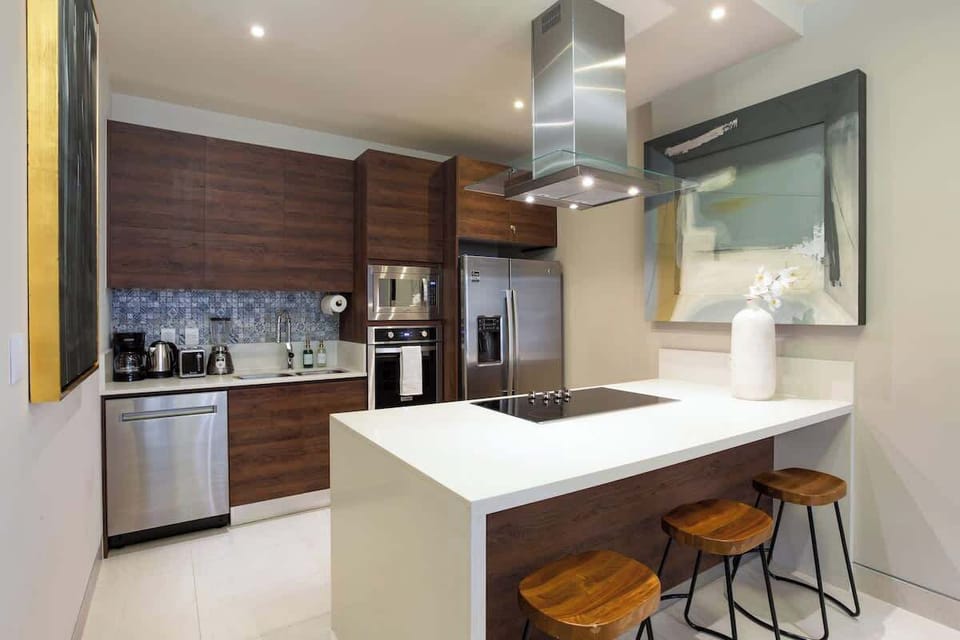 Cook with ease in our fully-equipped kitchen with an electric cooktop, oven, microwave, and refrigerator. Don't worry about the clean-up - the dishwasher has got you covered. Pots, pans, knives, plates, bowls and silverware are provided.