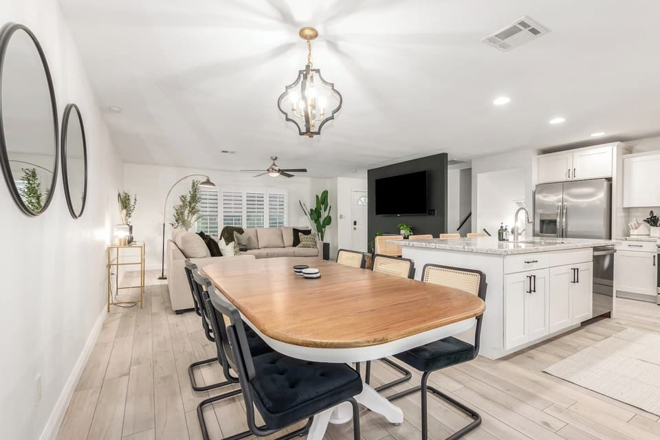 Dining area next to the kitchen for easy serving and shared meals.