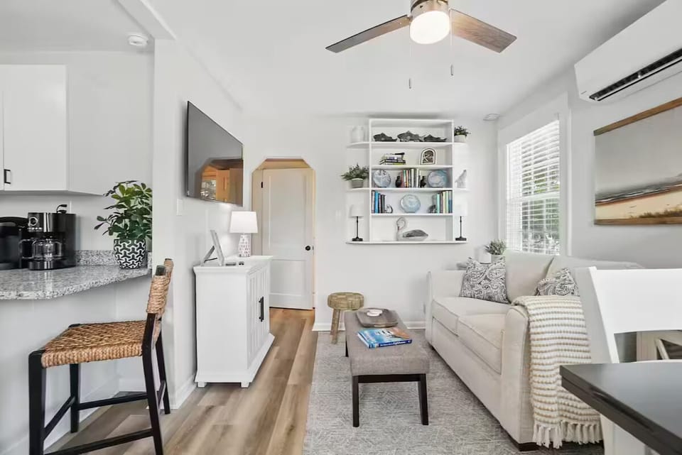 Relax in your bright, cozy cottage living room—perfect for quiet mornings.