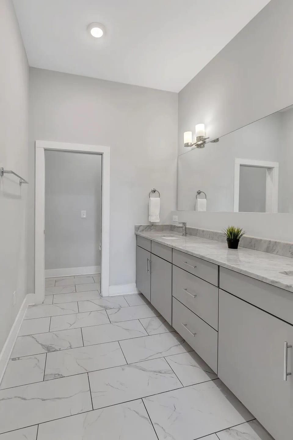 Ensuite bathroom attached to third-floor primary bedroom with walk-in shower