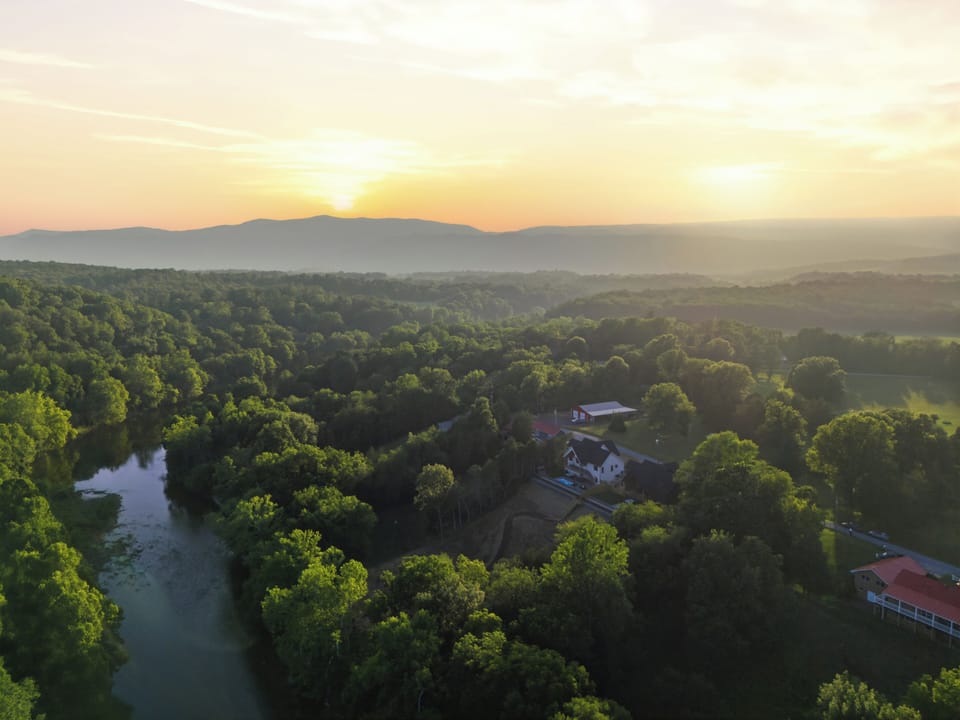Perched on a scenic bluff over the South Fork of the Shenandoah River