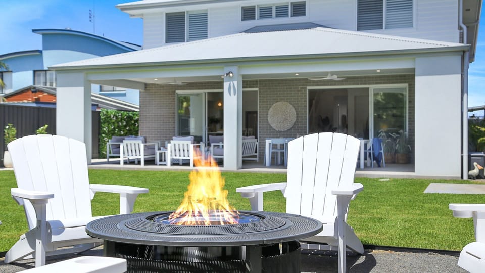 Hamptons Hideaway | Firepit | Enclosed yard | Pets welcome | Garden area | Covered outdoor patio | Outdoor shower