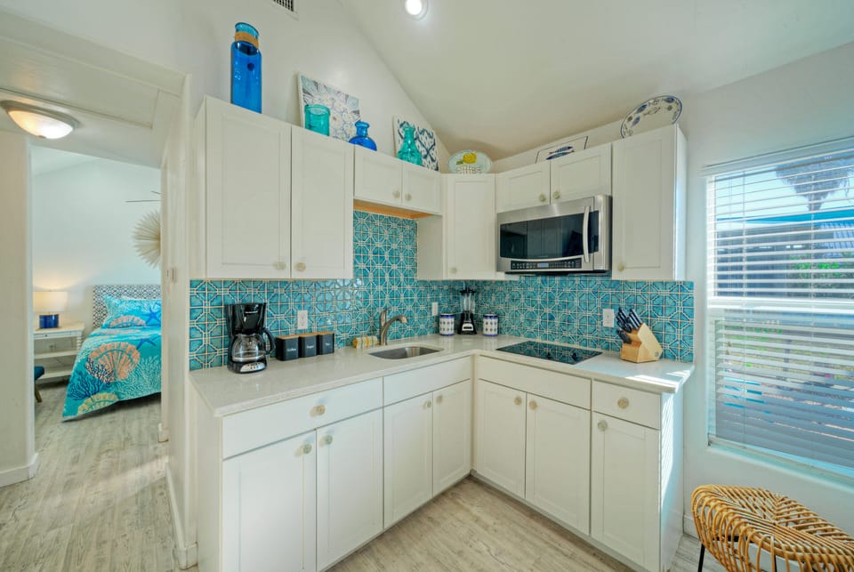 Kitchenette stocked with all the necessities.