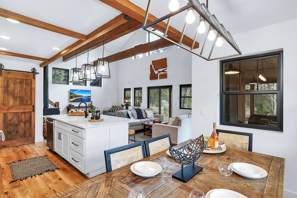A an easy to navigate but dialed kitchen, a real dining table, and an easy open layout make it simple to cook, eat, and hang out together