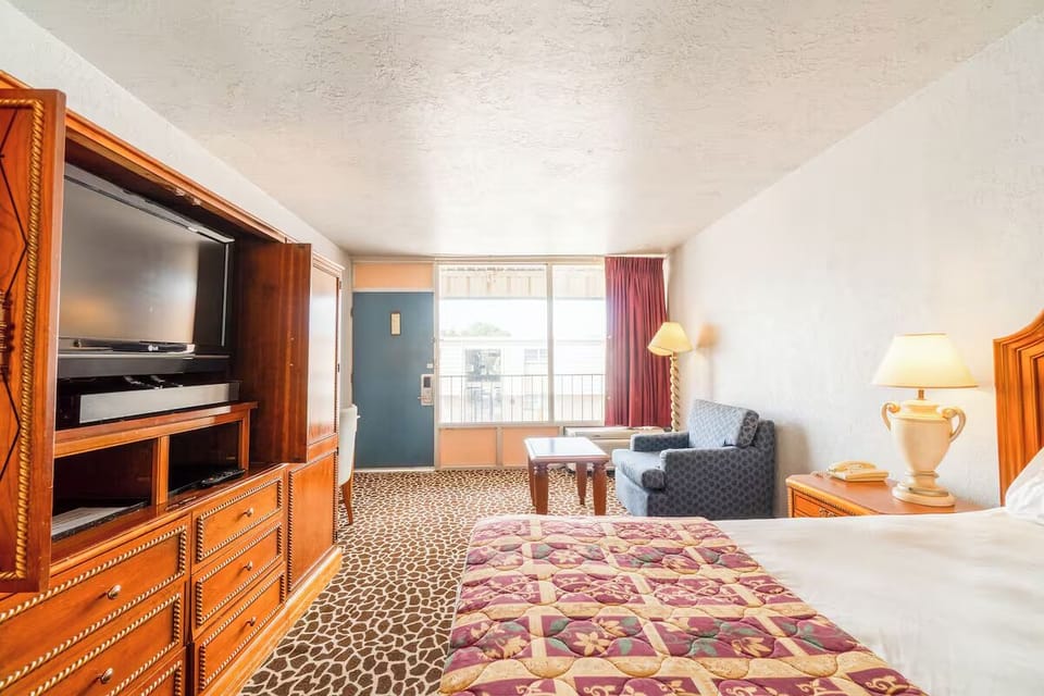 Settle in for movie nights beside bright window views.