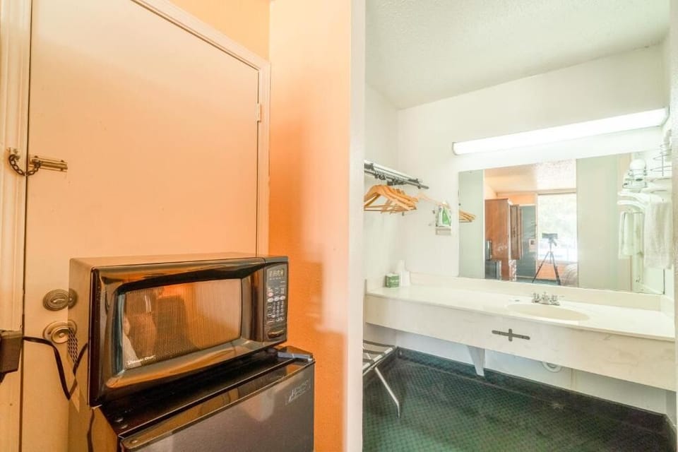 Refresh easily with bright vanity space and convenient in-room microwave.