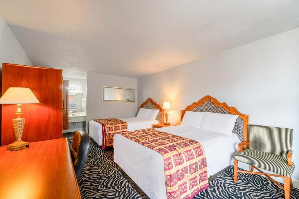 Stretch out after a long day in crisp, inviting beds.