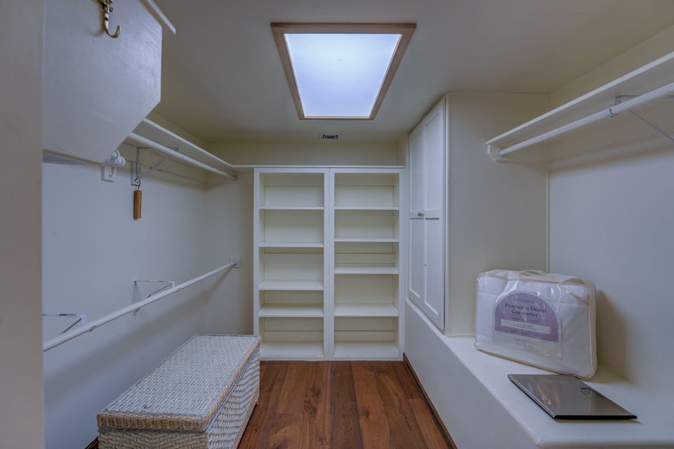 Primary master suite has a walk-in closet.