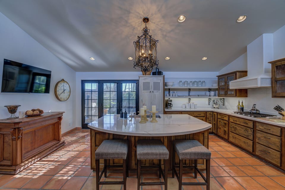 The kitchen island is perfect for breakfast or casual dining.