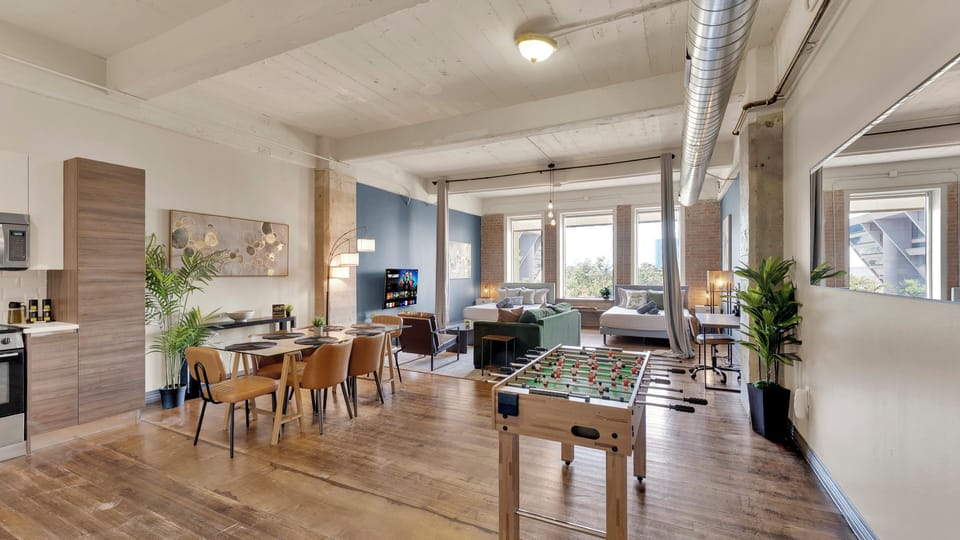 Expansive loft with open living, dining, and sleeping areas.