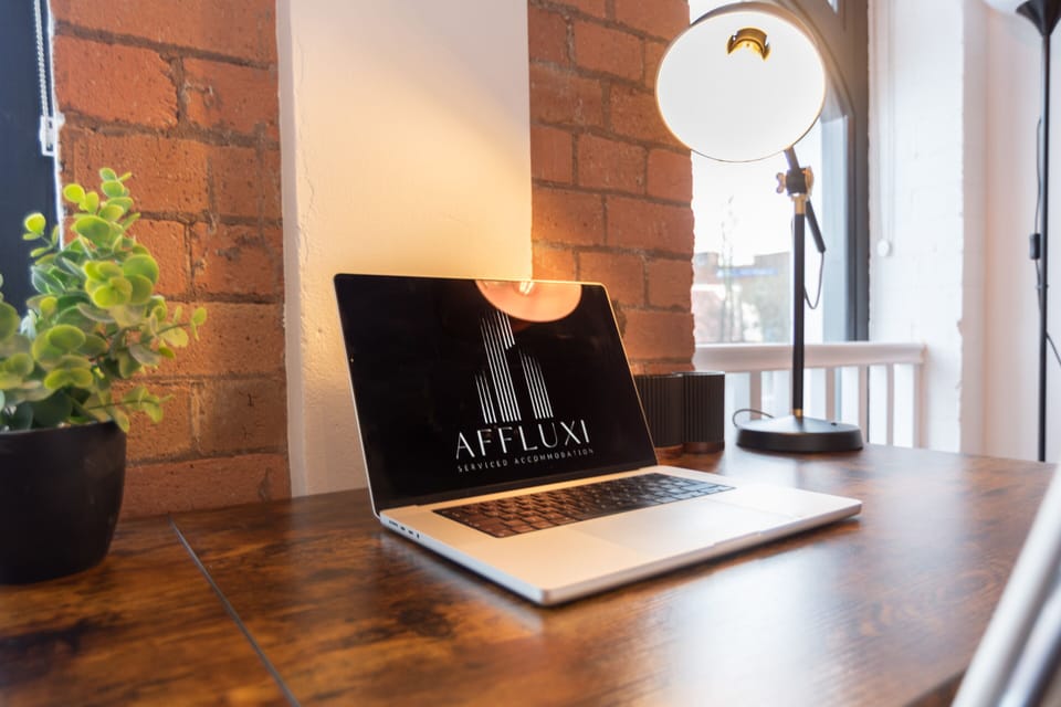 Dedicated workspace with desk and lamp - ideal for working remotely during your stay.