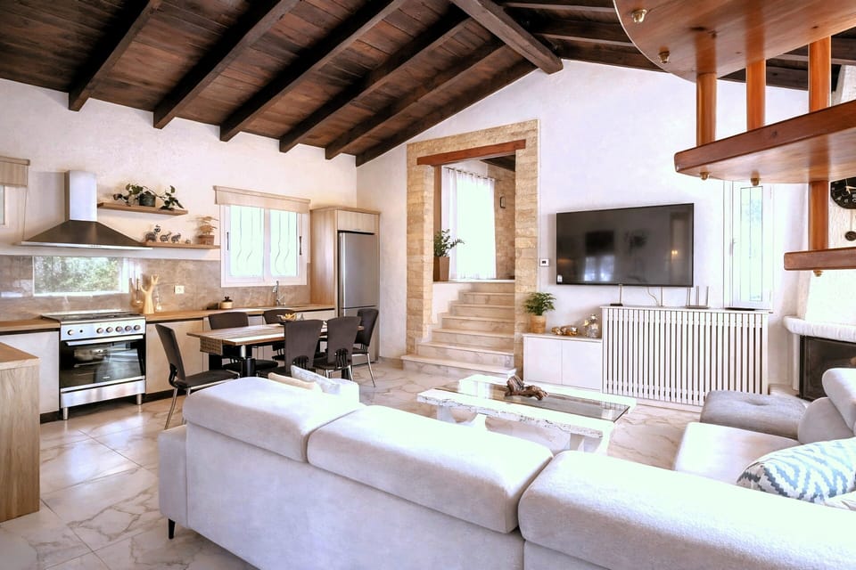 Spacious open living zone connecting kitchen and lounge