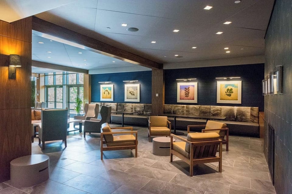 Sip coffee in a stylish lounge designed for calm, casual mingling