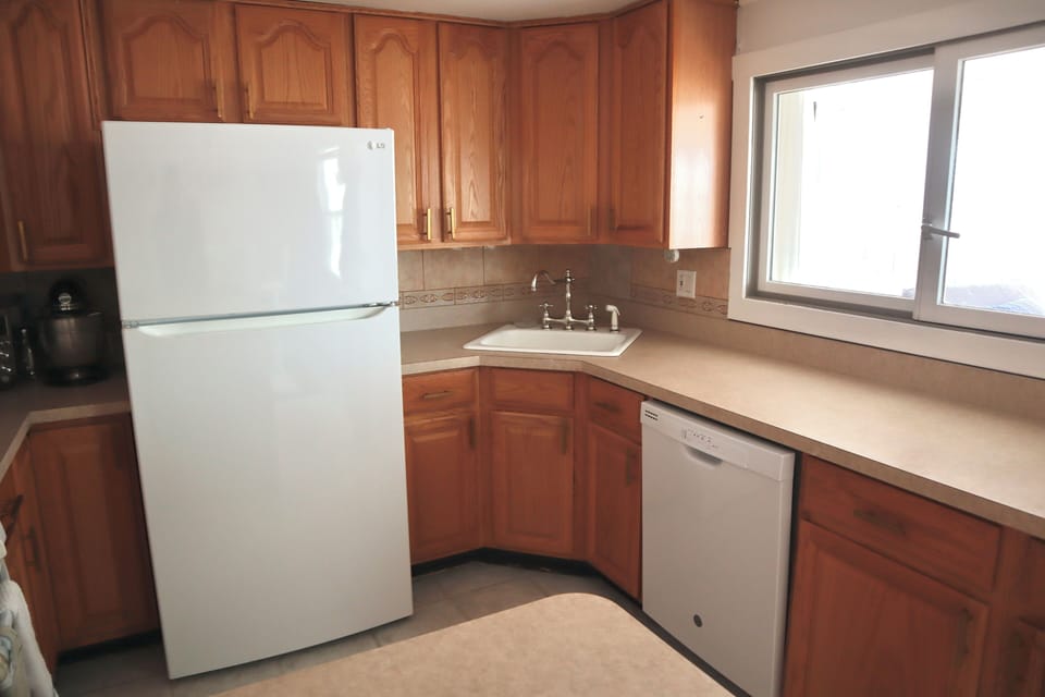 Kitchen includes: Large griddle, two waffle irons, toaster oven.