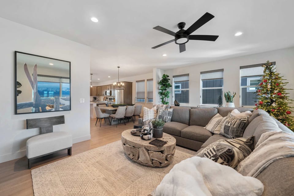 Living Room: Mountain views, modern vibes, and total comfort. Our living room is the ultimate short-break sanctuary. Curl up on the plush sectional, watch a movie on the big screen, and let the Bridger Mountains be your backdrop.